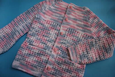 Hand Knitted Winter Snowy Cardigan With Pockets
