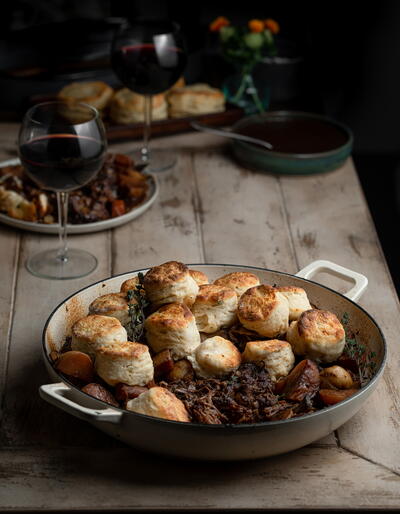 Elevated Red Wine and Dark Chocolate Pot Roast with Homemade Biscuit Topping