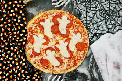 Scare Up Halloween Fun With This Ghost Pizza