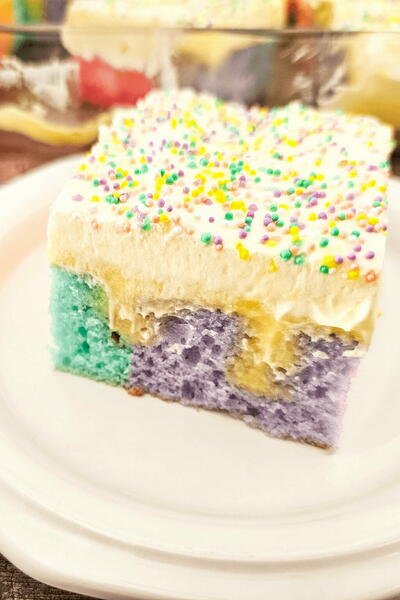 Rainbow Pudding Poke Cake