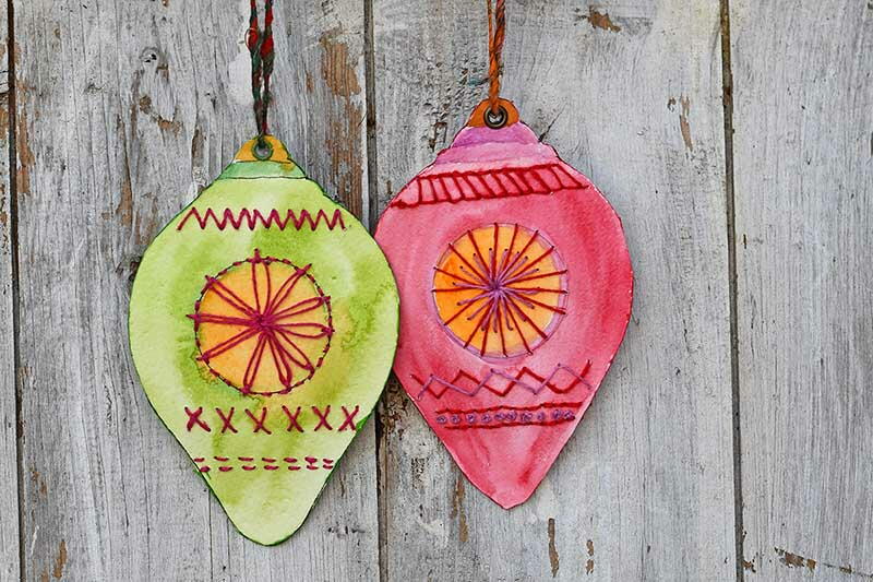Embroidered Paper Baubles | AllFreeChristmasCrafts.com