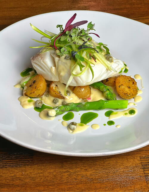 Poached Halibut with Vegetables and Lemon-Caper Beurre Blanc