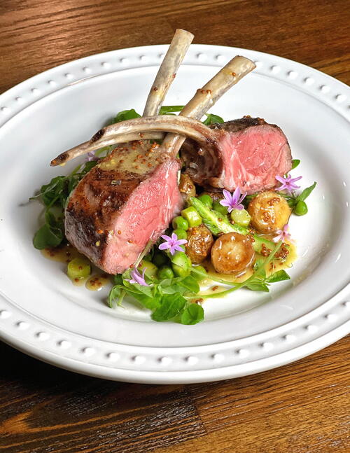 Rosemary-Garlic Rack of Lamb with Roasted Vegetables and Mustard Vinaigrette