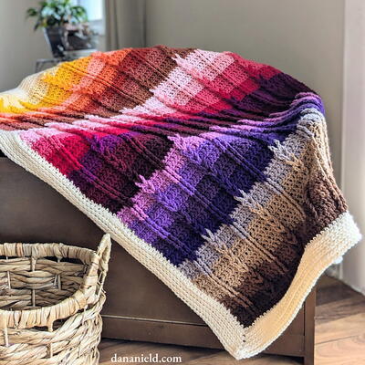 Jacob’s Colorful Cables Crochet Baby Blanket