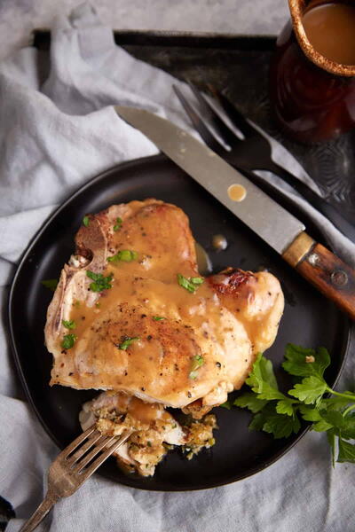 Juicy And Tender Stuffed Pork Chops With Herbed Stuffing And Gravy